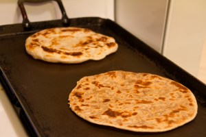 Done! You can see the plain one (in back) is puffier than the whole wheat one