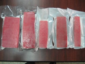 Blocks of frozen tuna come in different sizes and sometimes pre-sliced.  Make sure it is sushi-grade!
