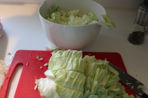 Cutting the cabbage into quarters makes it much easier to tackle